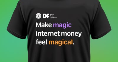 Close-up of a t-shirt with Bitcoin Design Community and Foundation logos, and the text 'Make magic internet money feel magical'
